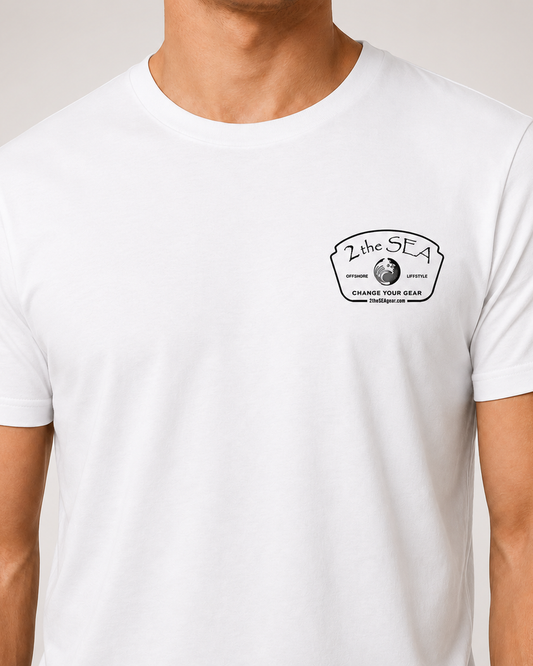 Close-up front view of The Mark white 2theSEA T-shirt showing the black Change Your Gear badge graphic on the left chest.