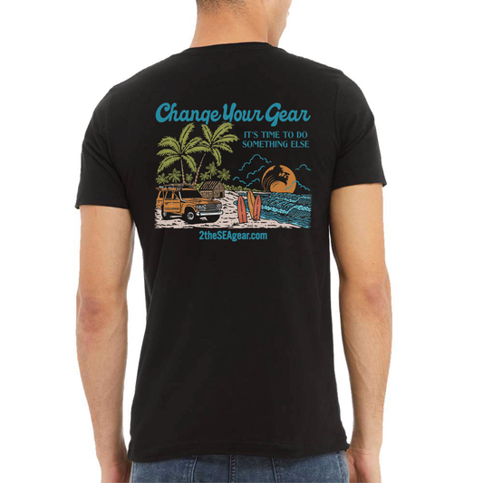 Back view of 2theSEA BEACH IT T-Shirt in Black featuring the colorful Change Your Gear beach graphic with palm trees, surfboards, shoreline, vehicle, and wave scene.