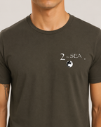 Close-up front view of The Break Army 2theSEA T-shirt showing the wave logo graphic on the left chest.