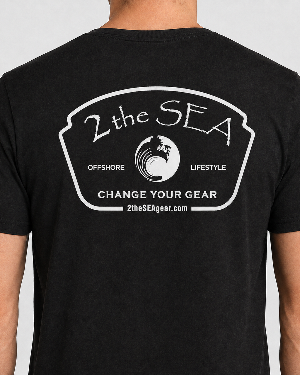 Close-up back view of The Mark dark grey 2theSEA T-shirt showing the large light Change Your Gear badge graphic.