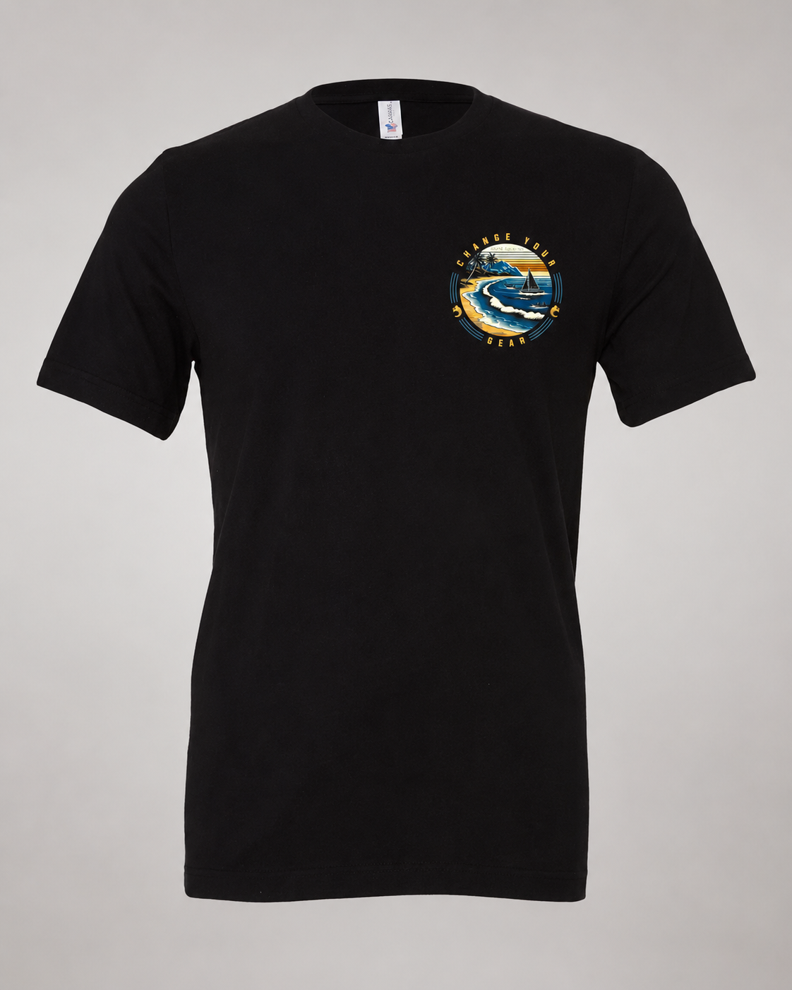 Studio front view of The Passage Black 2theSEA T-shirt featuring the shoreline, sailboat and wave graphic on the left chest.